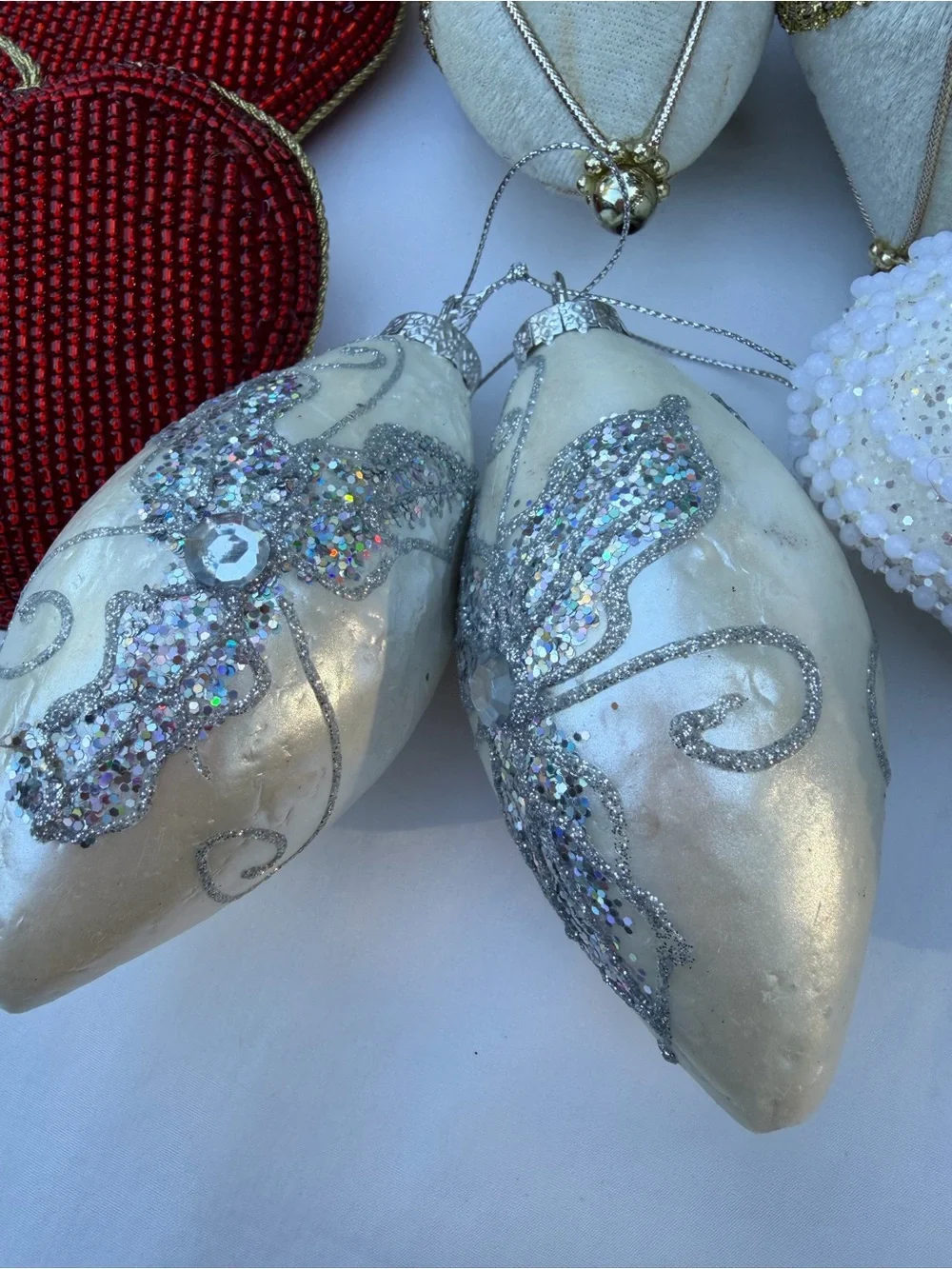 Lot of assorted Holiday Christmas Ornaments in Red, Gold, and White